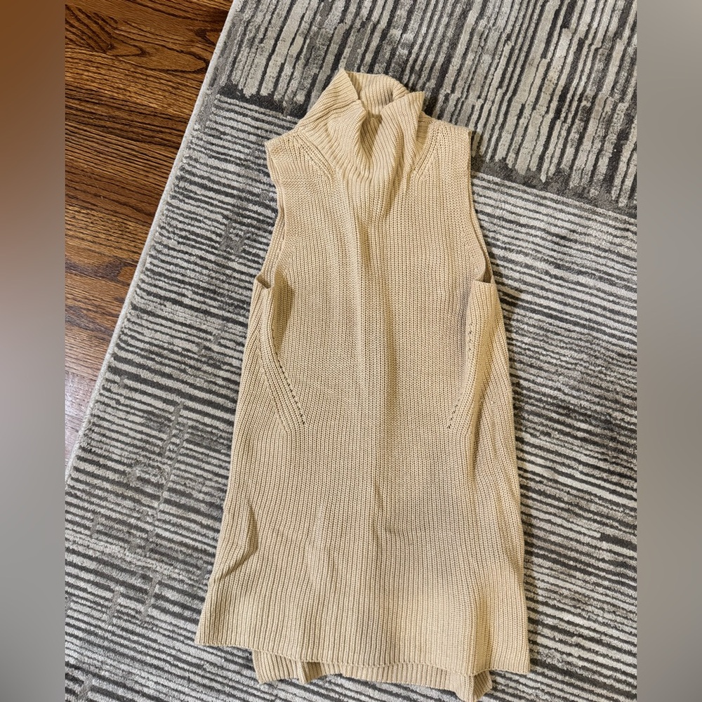 Beige turtleneck sleeveless sweater